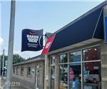 Baker Design Wear - Custom Awning and Blade Mount Sign