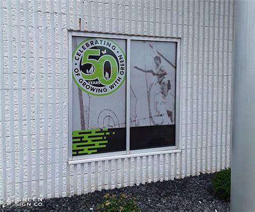 Green Sign Company - Custom Perforated Vinyl Window Graphics